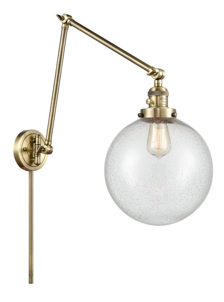 Innovations Lighting Beacon 10" Swing Arm - Antique Brass