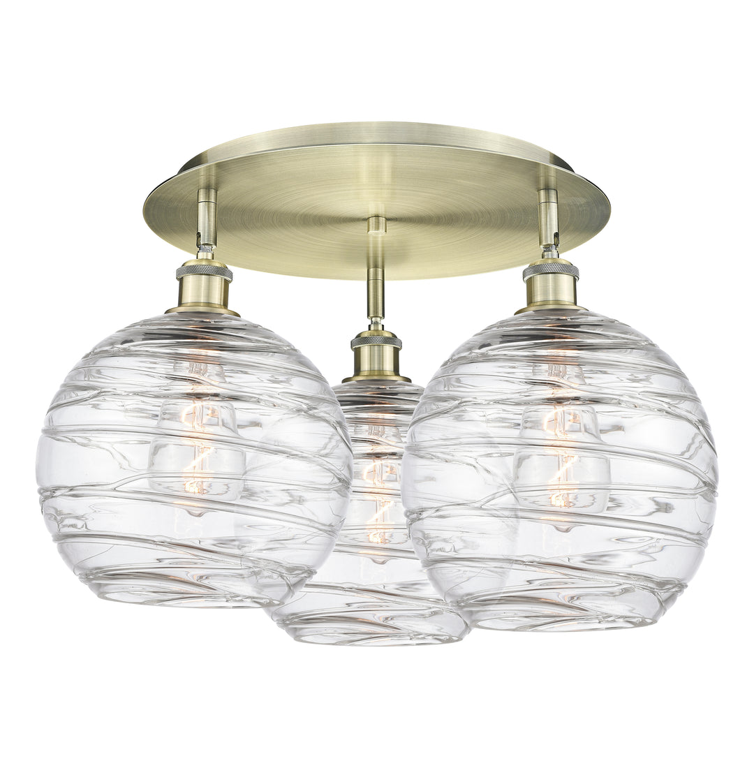 Innovations Lighting Athens Deco Swirl 10" Flush Mount Ceiling Flush Mounts Innovations Lighting Antique Brass Clear Deco Swirl ; Glass Type: Transparent 