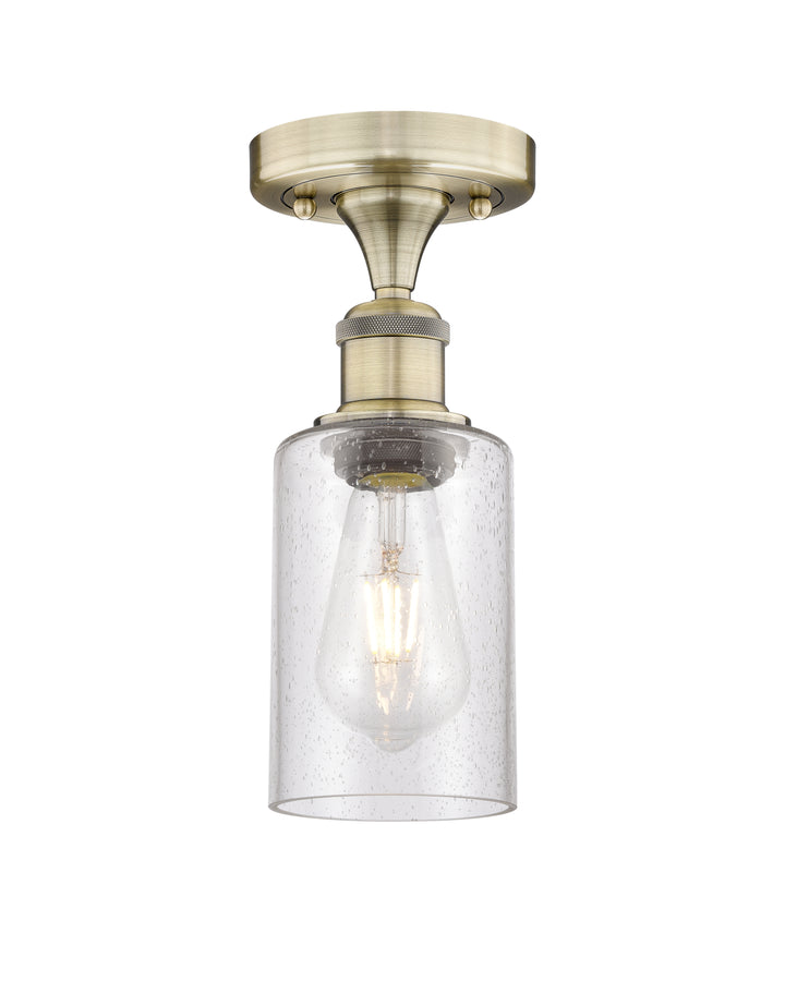 Innovations Lighting Clymer 4" Semi-Flush Mount - Antique Brass Ceiling Semi Flush Mounts Innovations Lighting Seedy ; Glass Type: Transparent  