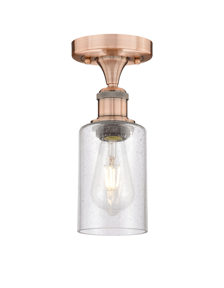 Innovations Lighting Clymer 4" Semi-Flush Mount - Antique Copper Ceiling Semi Flush Mounts Innovations Lighting Seedy ; Glass Type: Transparent  