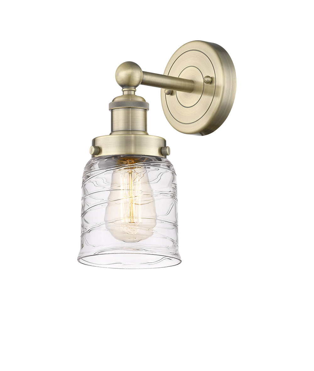 Innovations Lighting Bell 5" Sconce - Antique Brass Wall Sconces Innovations Lighting Clear Deco Swirl ; Glass Type: Colorful; Ribbed  