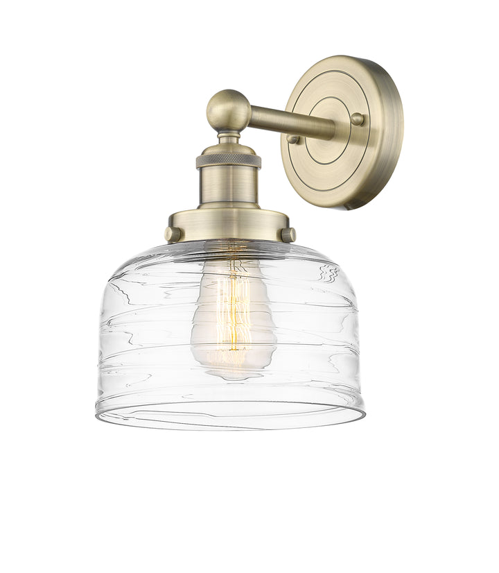 Innovations Lighting Bell 8" Sconce - Antique Brass Wall Sconces Innovations Lighting Clear Deco Swirl ; Glass Type: Colorful; Ribbed  