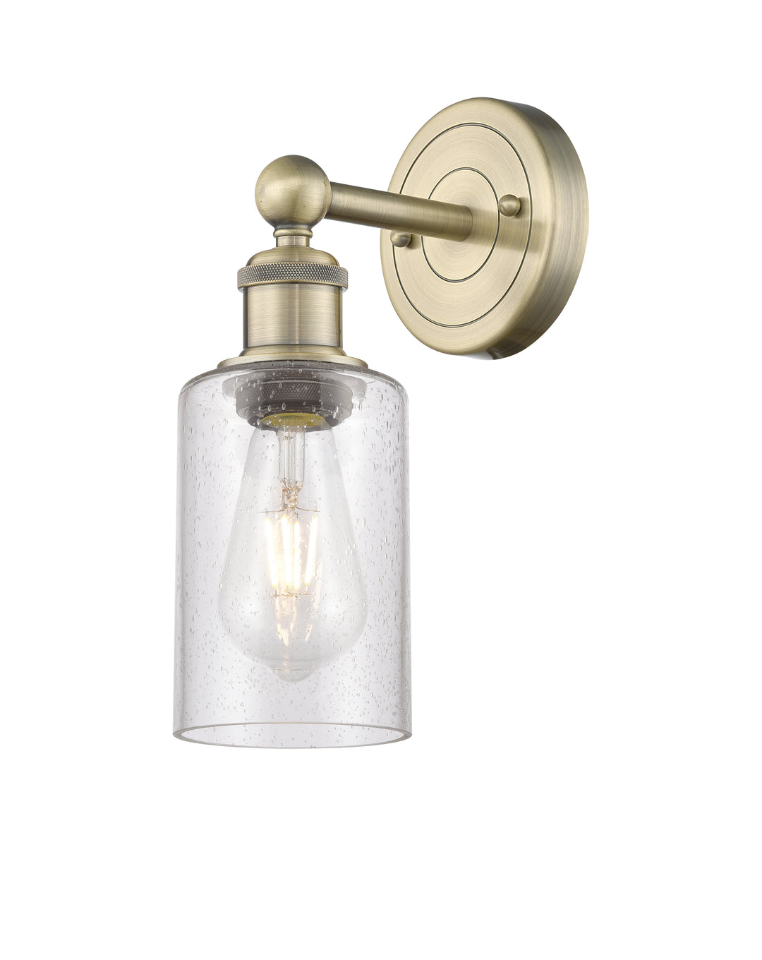 Innovations Lighting Clymer 4" Sconce - Antique Brass Wall Sconces Innovations Lighting Seedy ; Glass Type: Transparent  